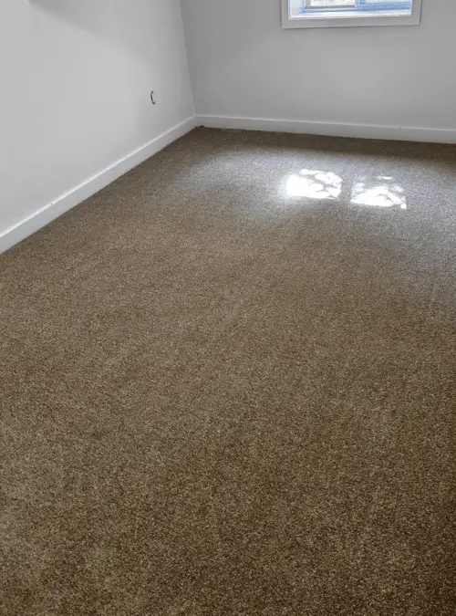 New bedroom carpet installed over underpad in White Oaks, London after professional installation, cozy and finished look