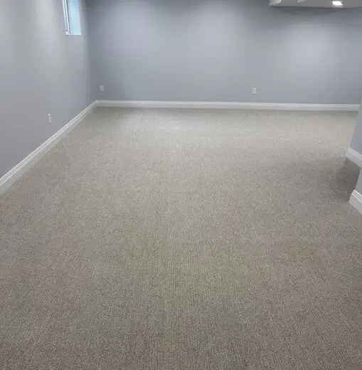 New basement carpet installation in Masonville, London, Ontario after professional installation, warm and finished look