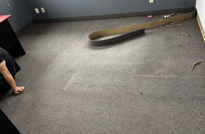 Commercial carpet floor in London, Ontario before replacement installation.