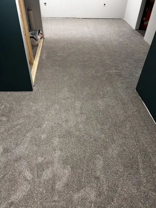 Grey plush basement carpet installed in Masonville, London Ontario after professional installation