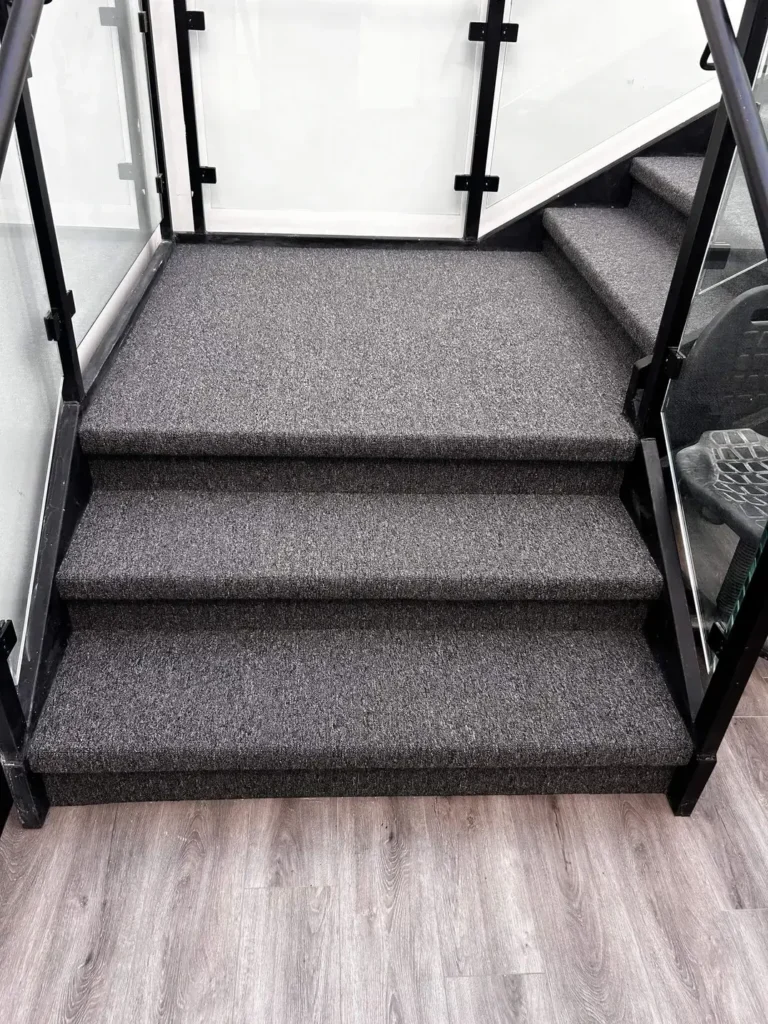 uplink 20 staircase carpet installation in down town london. Durable commercial flooring