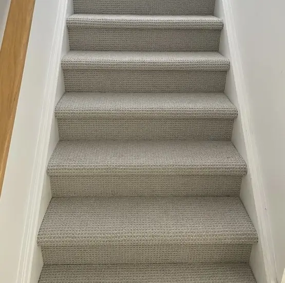 Newly installed staircase carpet in Huron Heights, London, Ontario after professional installation