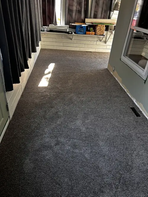 Taupe bedroom carpet installed in Byron, London, Ontario after professional carpet installation, clean and cozy look