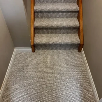 Bleached Wheat carpet from Interstellar installed on a staircase with landing in London, Ontario by Master Carpet