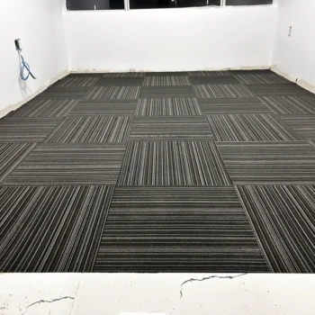 Office space with black commercial carpet tile, line pattern, quarter-turn layout – Downtown London ON