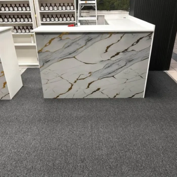 Uplink 20 commercial carpet installed wall-to-wall in retail store at mall, durable and professional flooring in London