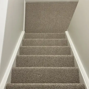Interstellar Berber carpet professionally installed on a residential staircase in London, Ontario by Master Carpet