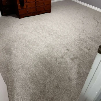 Master bedroom carpet installation in Woodstock, Ontario featuring Serenity Light Sand. A plush, neutral-toned carpet.