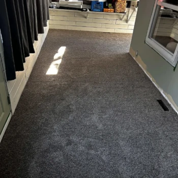 Playroom carpet installation in St. Thomas, Ontario featuring Serenity Pathway. Durable, easy-to-clean taupe carpet.
